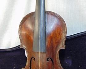 At least 7 early violins assorted musical instruments