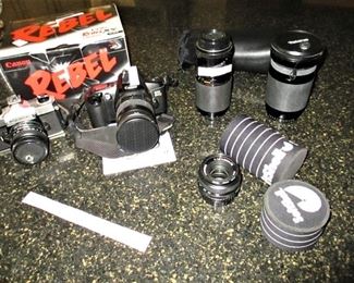 THE CAMERAS ARE PROFESSIONAL AND also large bag of filter lens, film etc. $125 to $100