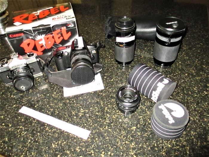 THE CAMERAS ARE PROFESSIONAL AND also large bag of filter lens, film etc. $125 to $100