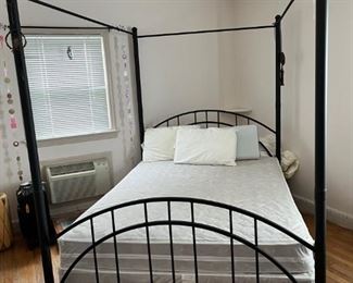 Full size four post canopy bed in black, selling with or without mattress.