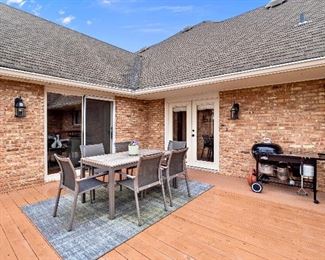 Gloster Outdoor Teak Wood Dining Table and Chairs, Outdoor Area Rug and Weber BBQ w/ Gas Start and Rolling Stainless Steel Prep Table  