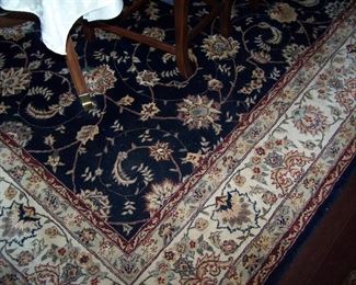 AREA RUG IN THE DINING ROOM