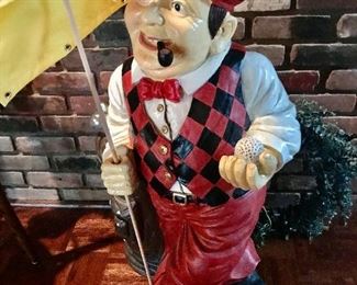 3’ tall golfer statue - basement 