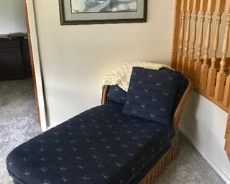 Wicker chaise lounge - basement 