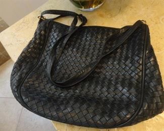 This lovely bag needs a repair on one corner and worth every bit the work to fix