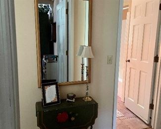 Small painted drop leaf table, large wooden mirror.
