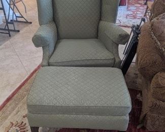 2 matching winged back chairs and ottomans