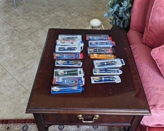 End table and decorative spoons