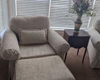 White overstuffed chair and ottoman