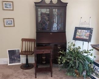 Secretary, wooden chair, plants, occasional table, easel, prints