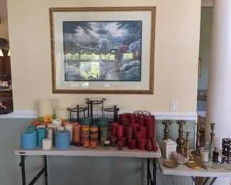 Candles of all sizes and colors, candle holders