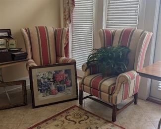2 matching winged back chairs