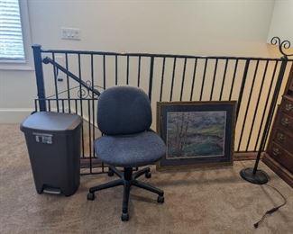 Desk chair, framed artwork,