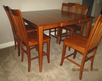 Bistro style table with 6 chairs