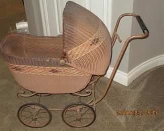 Vintage wicker child's baby buggy