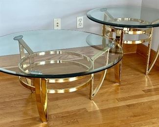 Two Brass and Glass Topped Accent Tables. These tables provide a timeless classy look! 

Coffee Table- 38" x 17" 

End Table- 27.5" x 21.5". 

Both items in very good condition with light wear. 