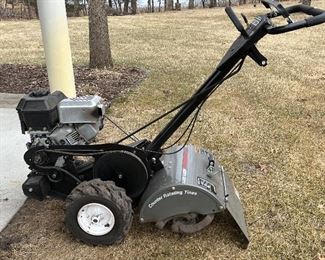 Craftsman Tiller-. 14" Rear Tine Tiller in good/used condition. 
