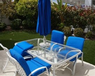 patio table, chairs and umbrella
