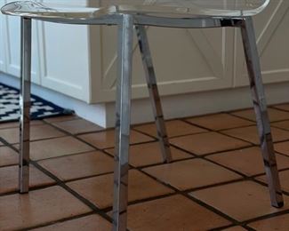 Set of 4 acrylic chairs with metal frames. Each measures 18" W with 17.5" seat height. Some chairs need new seat screws. Photo 2 of 2.