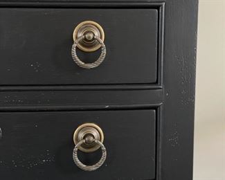Ebony four-drawer console with decorative pulls and shelf. Measures 46" W x 18" D x 36" H. Photo 4 of 4.