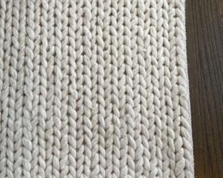 Chunky hand-woven wool rug. Measures 10' x 14'. Photo 2 of 3.