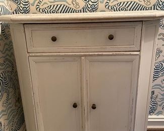 Vintage white cabinet. Measures 27" W x 10" D x 28" H. Photo 1 of 3.