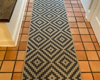 Graphic blue and white indoor/outdoor runner. Measures 27" x 11' 7."
