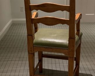 Set of three Caledonian oak ladder-back counter stools with green faux leather seats and nail head trim. Each measures 22" W with 24" seat height. Photo 2 of 4.