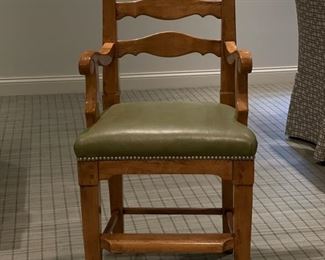 Set of three Caledonian oak ladder-back counter stools with green faux leather seats and nail head trim. Each measures 22" W with 24" seat height. Photo 1 of 4.