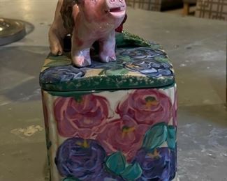 Decorative lidded jar with "pig handle."