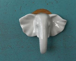 Chest of drawers with distressed aqua finish and elephant head and graphic pulls. Measures 36" W x 19" D x 31" H. Photo 3 of 4.