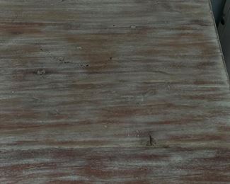 Side table with rustic finish and mirrored lattice front. Measures 22"W x 17" D x 29" H. Photo 2 of 2.