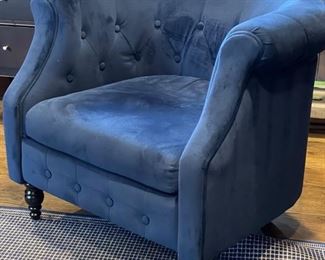Barrel Back Club Chair upholstered in blue velvet fabric with ebony legs. Please note, the true color is a bit darker than shown. Photo 1 of 2.