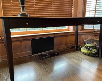 Crate & Barrel two-drawer desk. Measures 60" W x 28" D x 30" H. Matching two-drawer file cabinet available as well. Photo 1 of 2.