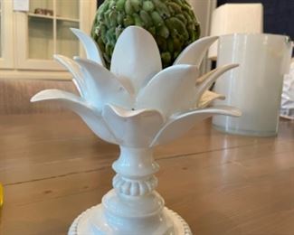 Decorative urn and faux moss ball.