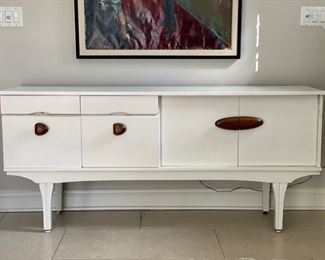 Mid-century white sideboard / credenza. Measures 65" W x 16" D x 30" H. Photo 1 of 3.