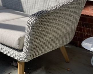 Mid-century modern-style woven all-weather wicker sofa. Photo 2 of 3.
