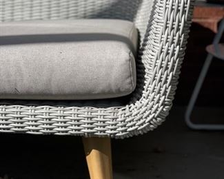 Mid-century modern-style woven all-weather wicker sofa. Photo 3 of 3.