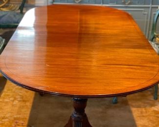 Vintage Georgian double pedestal mahogany dining table with brass claw feet. Measures 80" W x 31" D x 29" H with 28" clearance. Photo 2 of 4.
