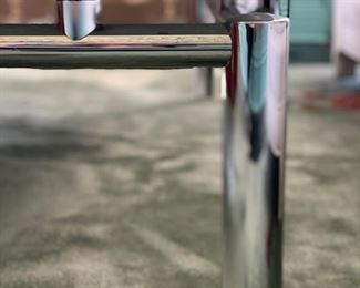 South Loop Loft marble and chrome cocktail table. Measures 55" W x 32" D x 13" H. Photo 3 of 3.
