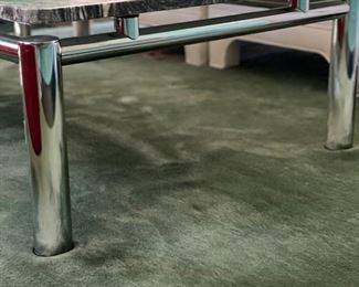 South Loop Loft marble and chrome cocktail table. Measures 55" W x 32" D x 13" H. Photo 2 of 3.