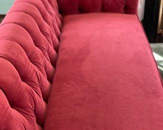 Chesterfield sofa upholstered in raspberry red chenille fabric. Measures 80" W x 34" D. Photo 2 of 3. 