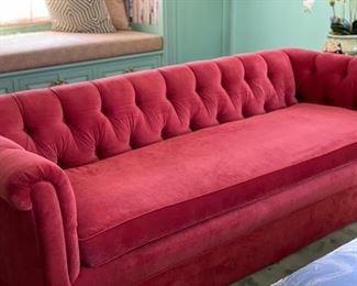 Chesterfield sofa upholstered in raspberry red chenille fabric. Measures 80" W x 34" D. Photo 1 of 3. 