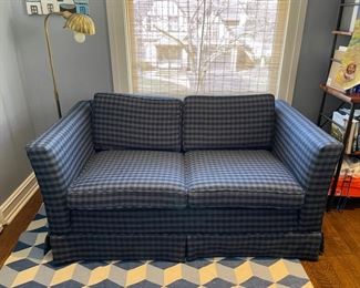 Wool blue plaid upholstered loveseat. Measures 48" W x 34" D. Photo 1 of 2.