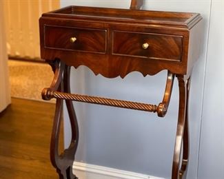 Vintage English flame mahogany valet stand. Measures 38" W x 22" W. Photo 1 of 2.