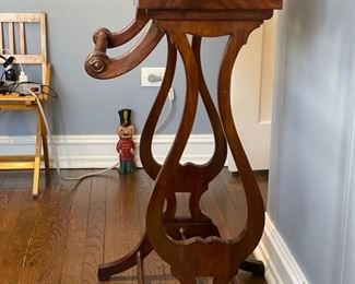 Vintage English flame mahogany valet stand. Measures 38" W x 22" W. Photo 2 of 2.