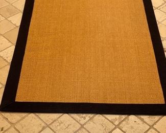 Fabric bound indoor/outdoor runner. Measures 27" x 5'.