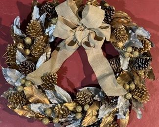 Silver & gold pinecone Christmas wreaths.