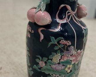 Navy urn with pomegranate handles and flowers. Photo 2 of 3.