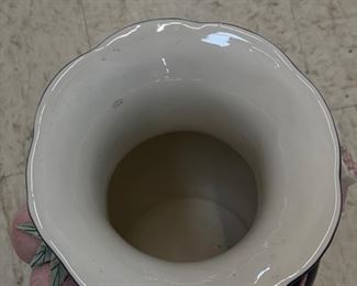 Navy urn with pomegranate handles and flowers. Photo 3 of 3.